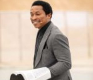a man holding a book