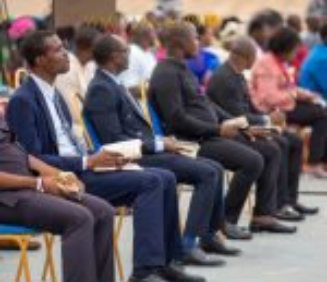 Several people sitting in chairs