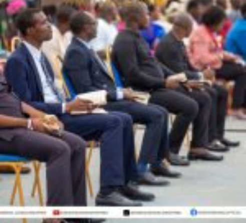 Several people sitting in chairs